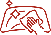 Red line drawing of a hand wiping a surface with a cloth, with sparkles indicating cleanliness or shine.